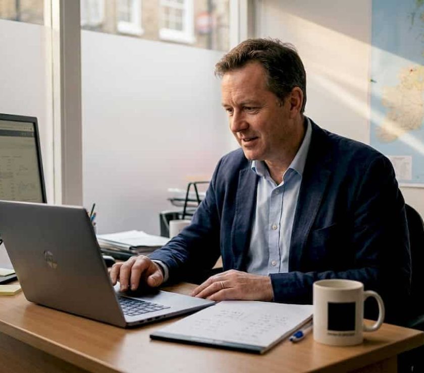 Business owner reviewing digital marketing analytics