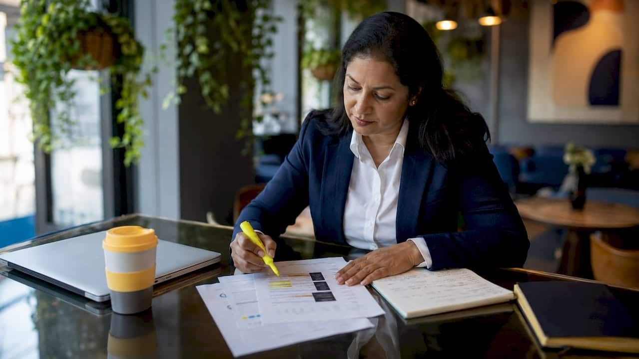 Woman reviewing strategic planning documents