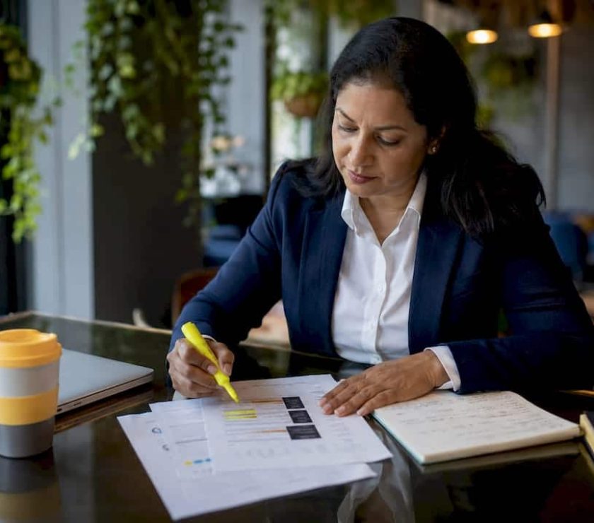 Woman reviewing strategic planning documents
