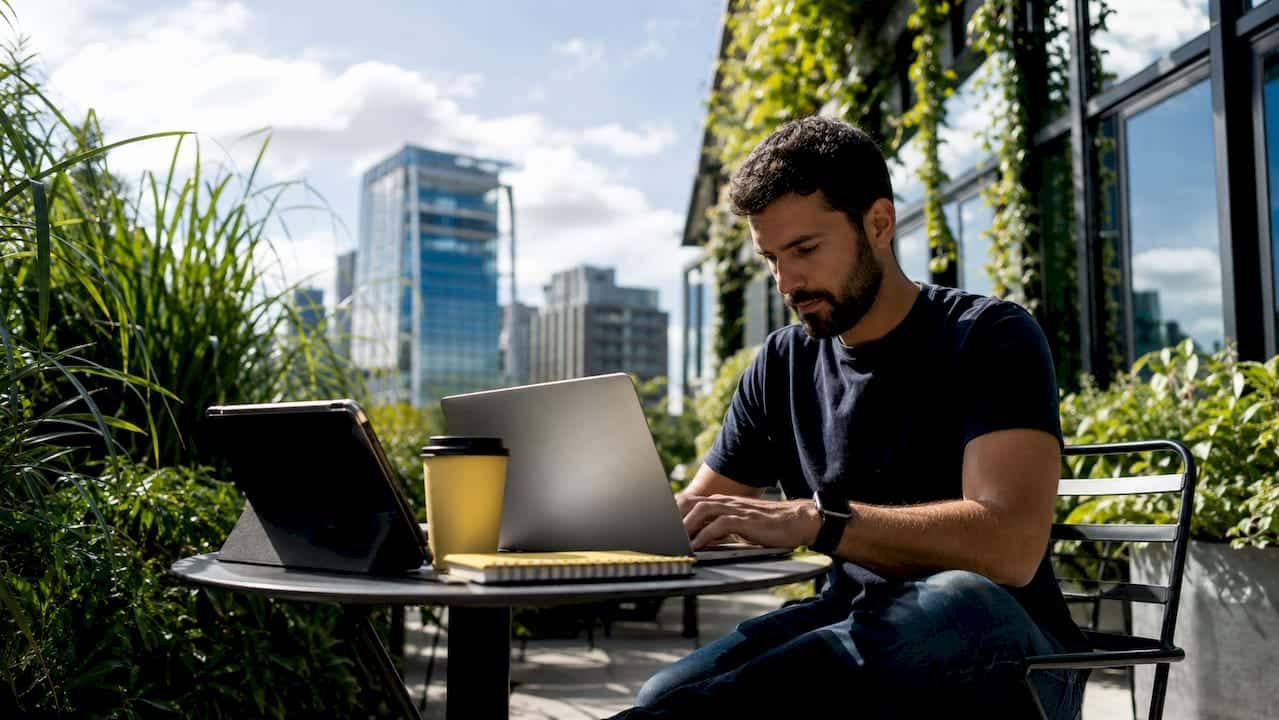 Digital marketing consultant working on laptop