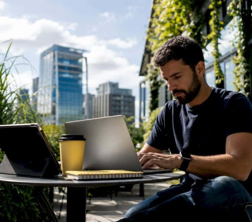 Digital marketing consultant working on laptop